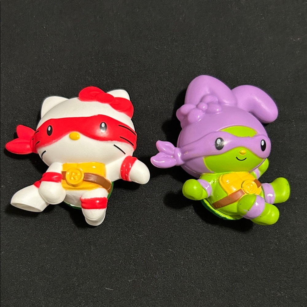 Hello Kitty x TMNT 
Raphael and Donatello